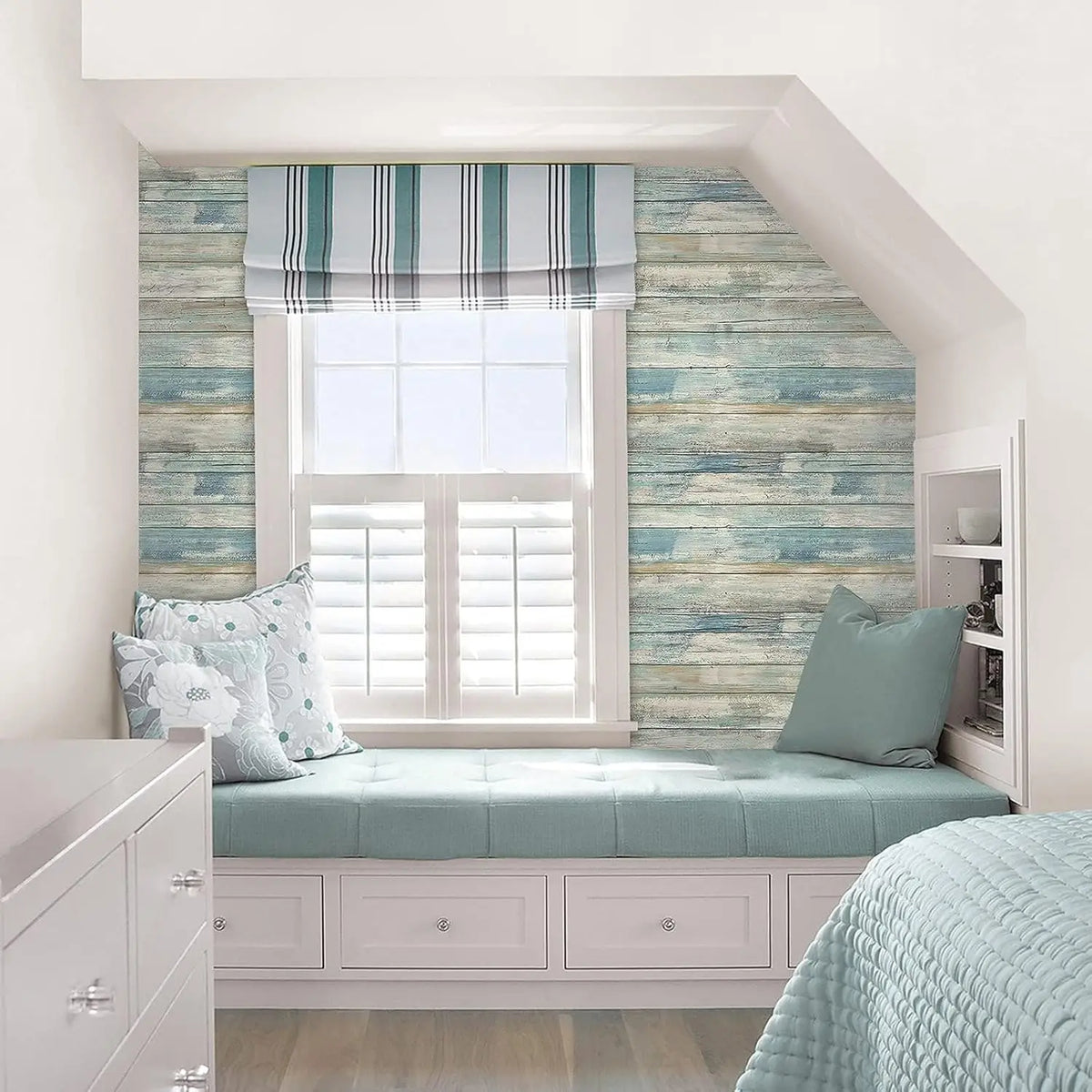 A bedroom featuring light blue wood grain wallpaper, a window with striped curtains, and a pale green bed frame.