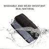 A black foldable makeup organizer bag is shown being washed in water, demonstrating its washable and wear-resistant material.