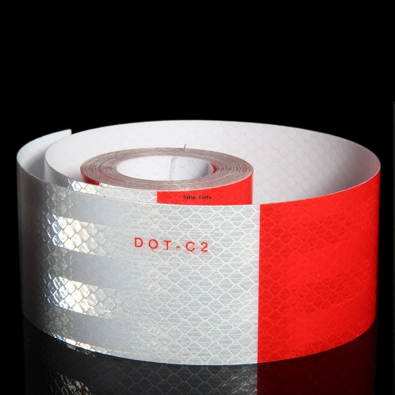 Roll of high-visibility reflective safety tape featuring white and red stripes with the text DOT-C2