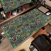 A large gaming mouse pad featuring a vintage city road design with buildings and greenery.