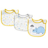 A set of three white soft cotton baby bibs with cartoon prints featuring trees and a dinosaur.