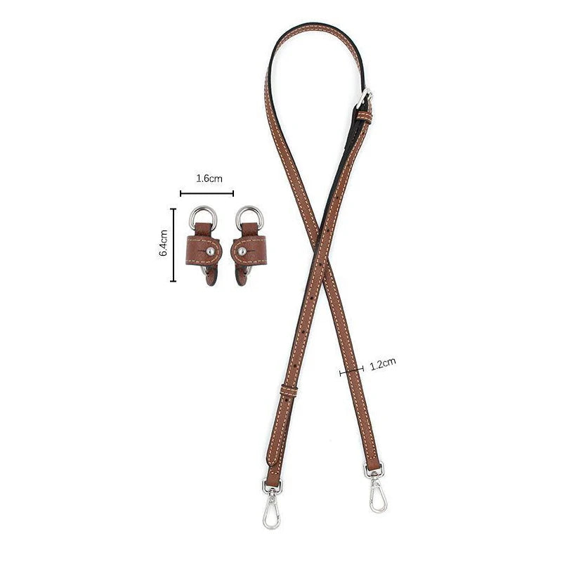 Brown leather shoulder strap with adjustable buckles and metal hardware