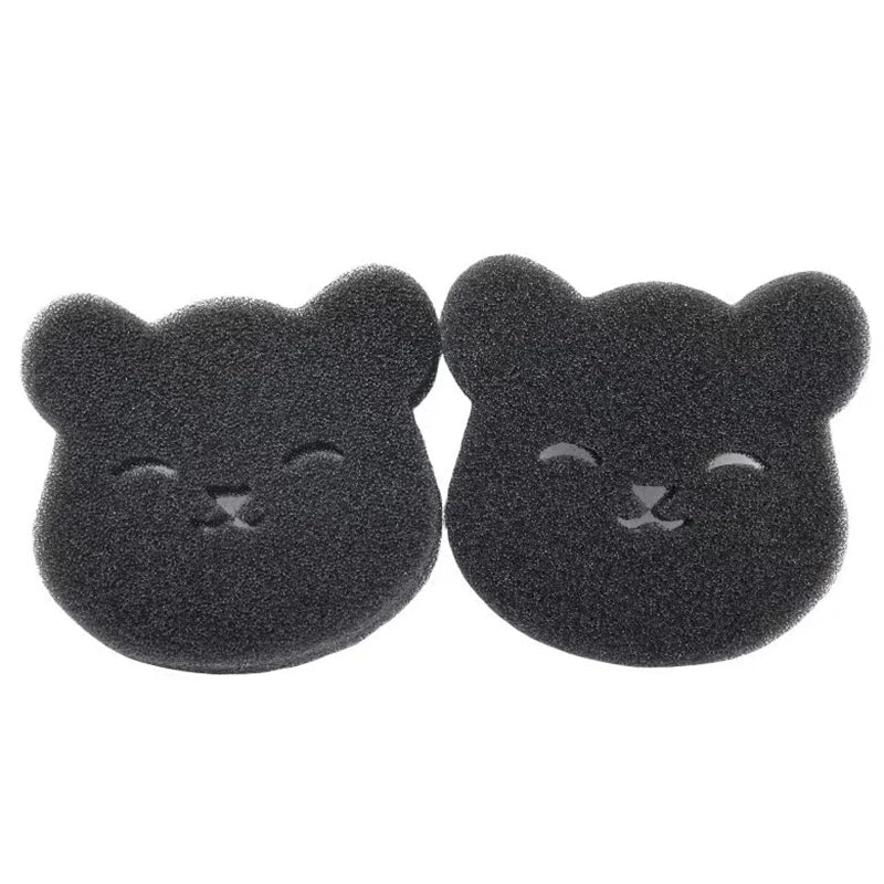 Une paire de tampons réutilisables pour enlever les poils d'animaux, en forme de chats mignons.