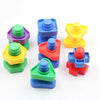 A collection of colorful screw building blocks in various colors like purple, blue, yellow, and green.