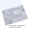 A set of acrylic letter beads stored in a grid box for jewelry making