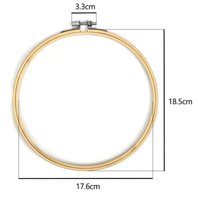 A circular bamboo embroidery hoop with a metal adjustable screw, measuring 18.5cm in diameter.