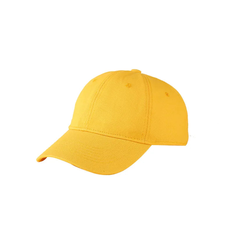 A bright yellow classic cotton dad hat shown from the side.