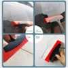 A set of red and black silicone tools used for scraping grout and sealant from tiles, car windows, and paint.