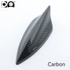 A black carbon fiber 5D shark fin car antenna with a piano paint finish.
