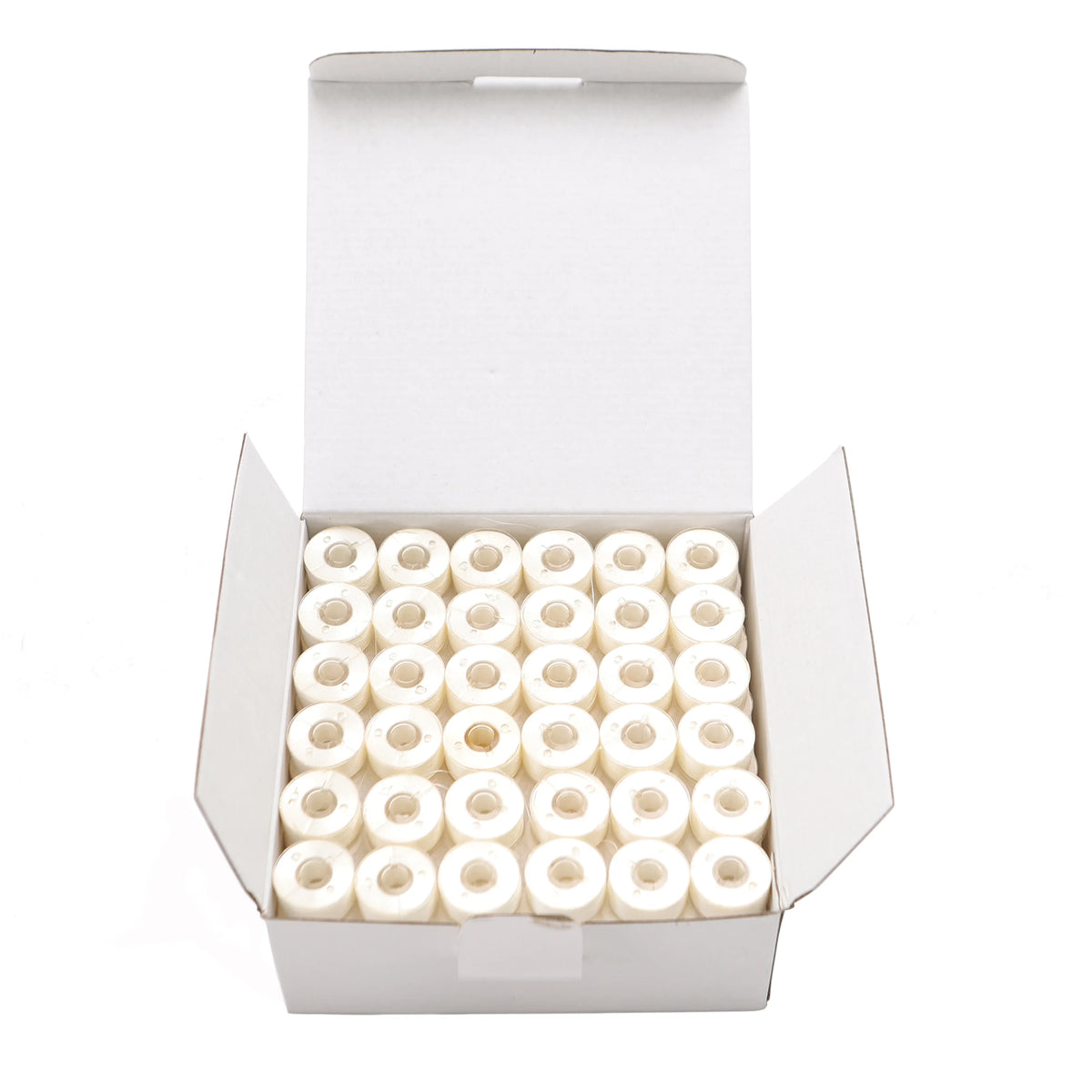 A white box containing numerous prewound bobbins with 60wt polyester thread for home embroidery machines