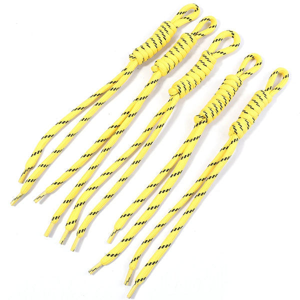 A set of colorful braided nylon keychains or lanyards in yellow and black stripes.