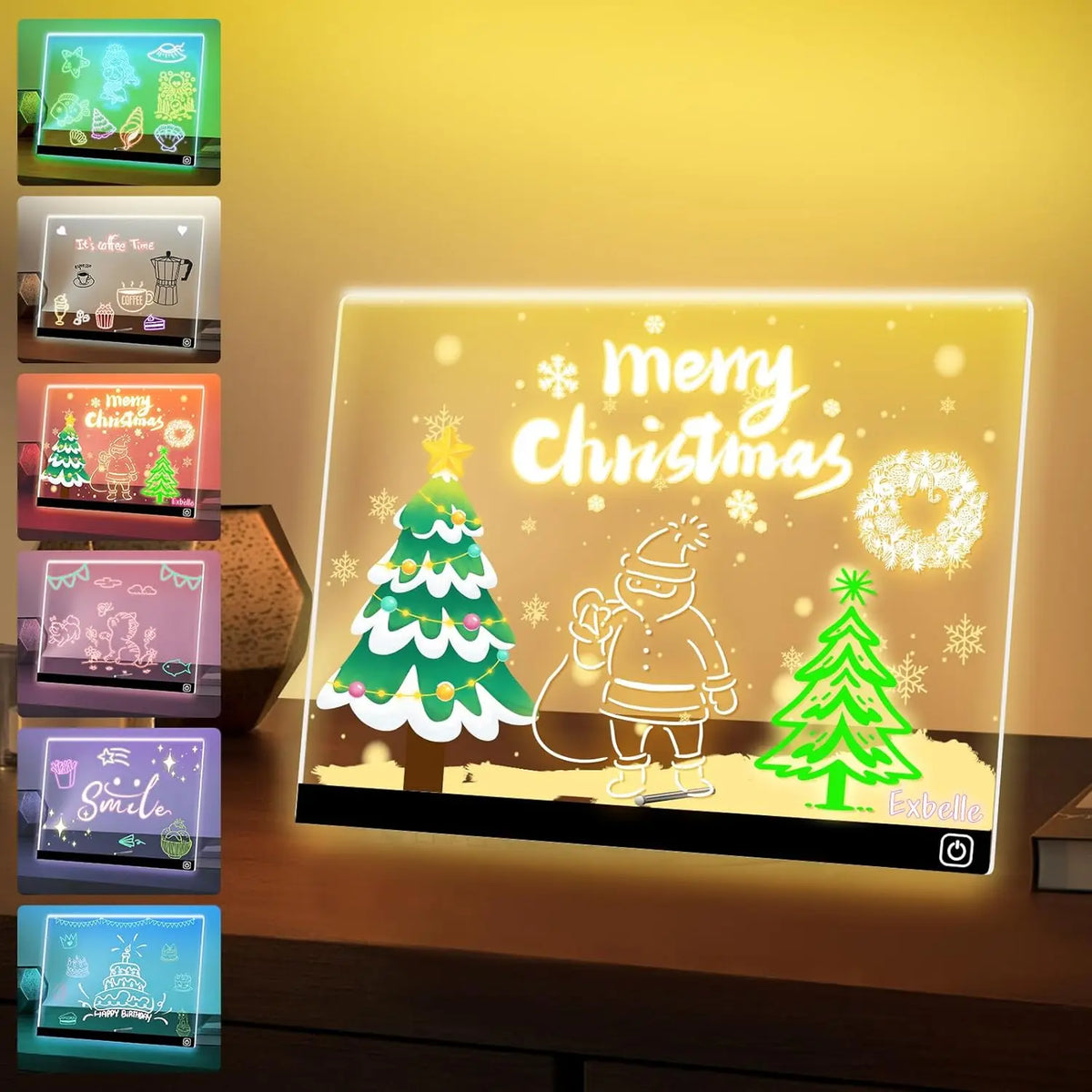 A display of seven LED drawing boards with various festive drawings and a glowing Christmas theme.
