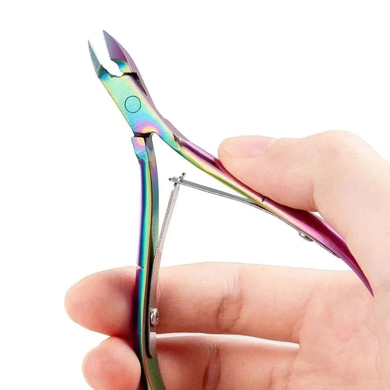 A hand holds a pair of professional stainless steel cuticle nippers with purple and green accents.