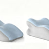 A white ergonomic memory foam wedge pillow with a light blue cover and detachable head rest shown from the side.