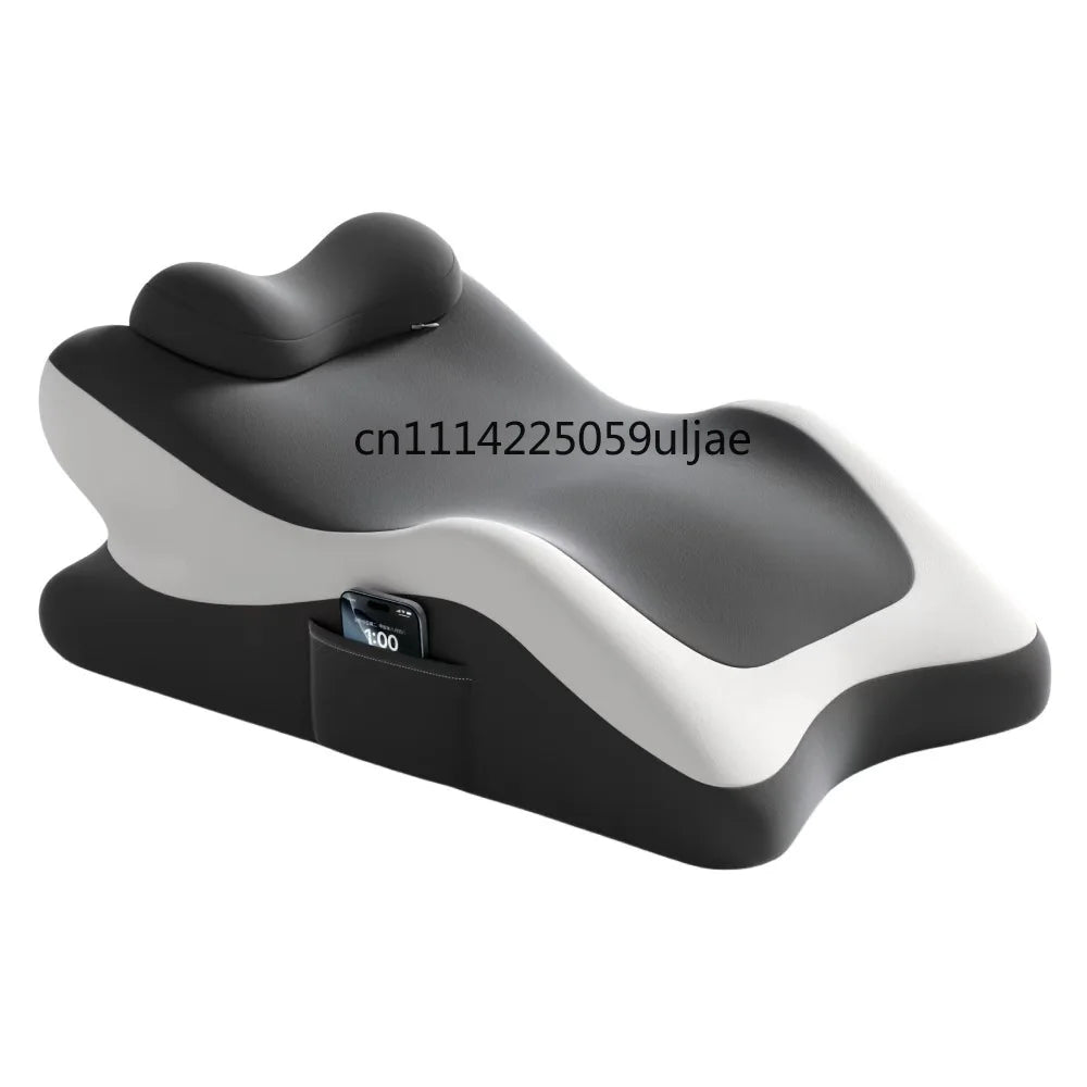 A gray and white memory foam full-body support pillow designed for sleeping, reading, or gaming.