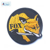 Embroidered patch featuring a stylized fox head in yellow and black on a black fabric with hook and loop backing