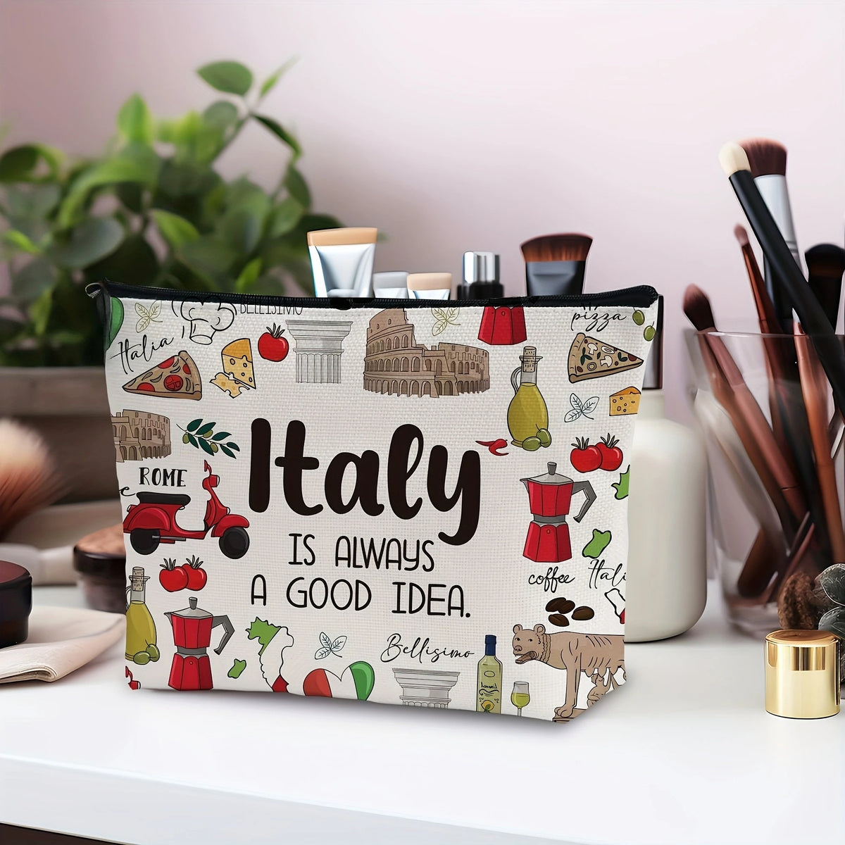 A fabric makeup bag featuring Italian landmarks and food icons, displayed on a white surface.