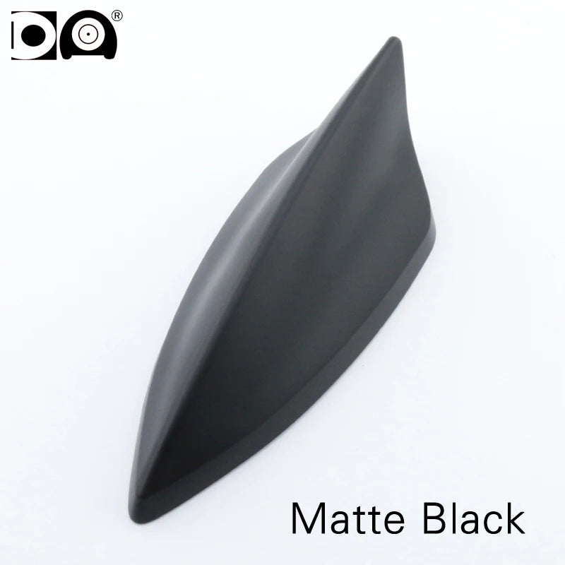 A matte black 5D shark fin car antenna for FM/AM signal reception.