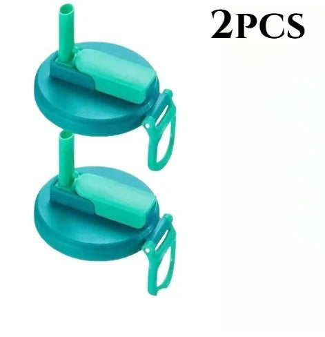 Two reusable silicone can lids with straws for beverages, colored teal and light green.