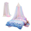 A pink and blue rainbow hanging dome canopy mosquito net with a purple bed inside.