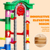 A colorful marble run with a motorized elevator structure made of plastic and wood components.