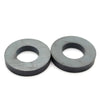 Two industrial-grade ceramic ring magnets with a dark gray finish.