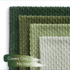 A stack of olive green and sage green corduroy throw pillow covers with vertical ribbed texture.