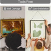 A framed painting is shown with a gold frame, demonstrating tools free installation and no wall damage.