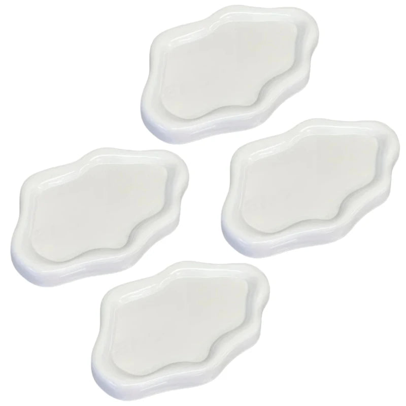 Three white cloud-shaped jewelry trays arranged diagonally on a white background.