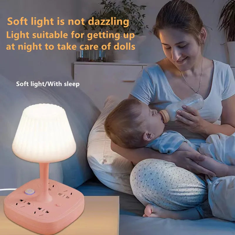 A soft light lamp is shown next to a mother caring for a baby in a bedroom setting.