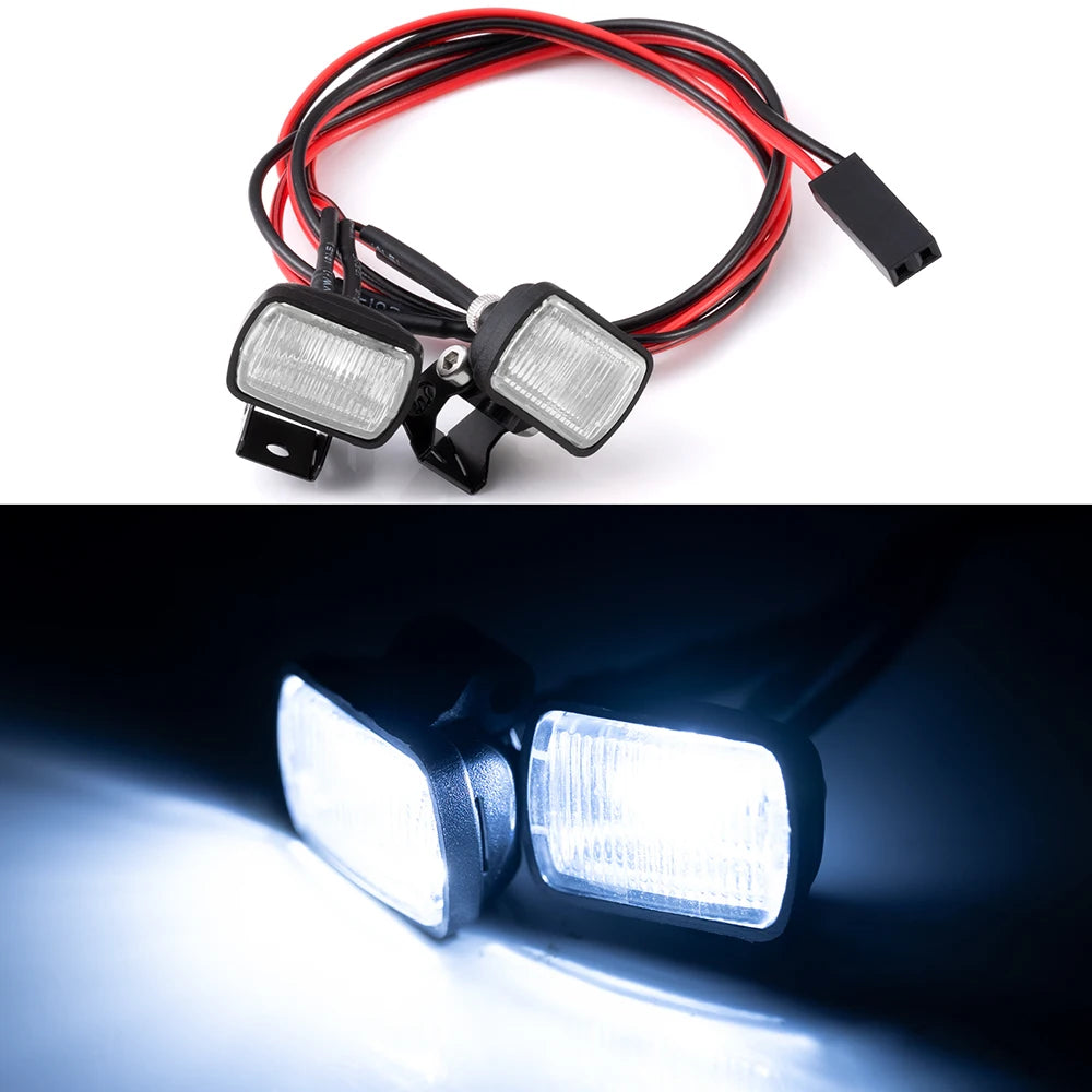 A set of LED headlights and spotlights with red and black wiring for 1/10 RC crawler trucks