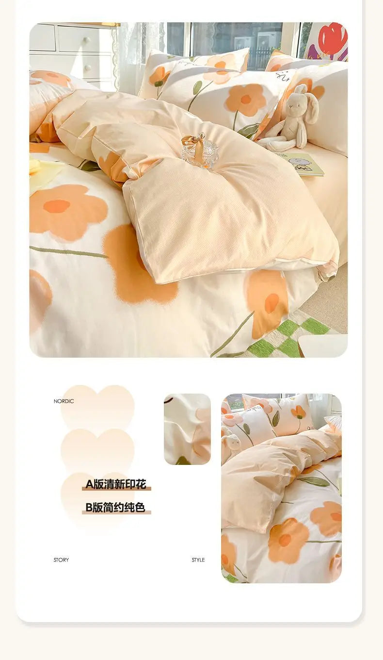 A set of pure cotton bedding including a duvet cover, fitted sheet, and pillowcases in a soft peach floral pattern.