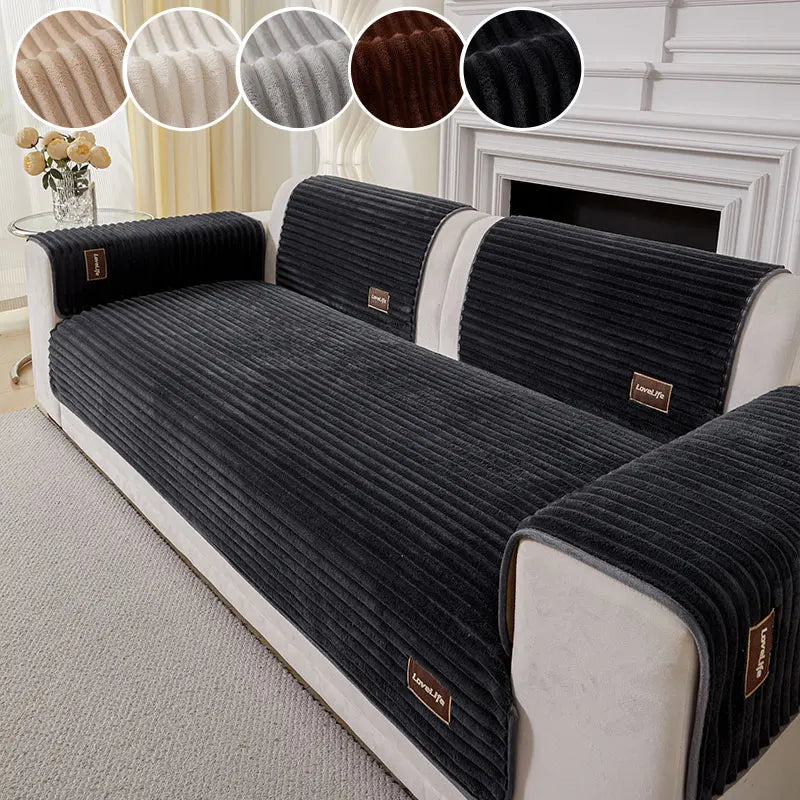 A black striped sofa cushion cover displayed on a white sofa, with fabric swatches shown in the upper corners.