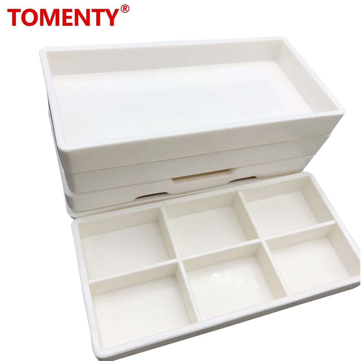 White plastic drawer organizer tray with multiple compartments for dental instruments