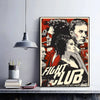 A poster featuring the Fight Club movie characters in black and red tones displayed on a wall.