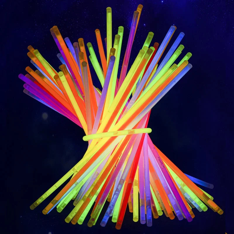 A bundle of bright, bendable glow sticks in various colors like orange, yellow, green, and purple.