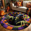 A round rug featuring a green, monstrous skull design with purple and orange geometric patterns.