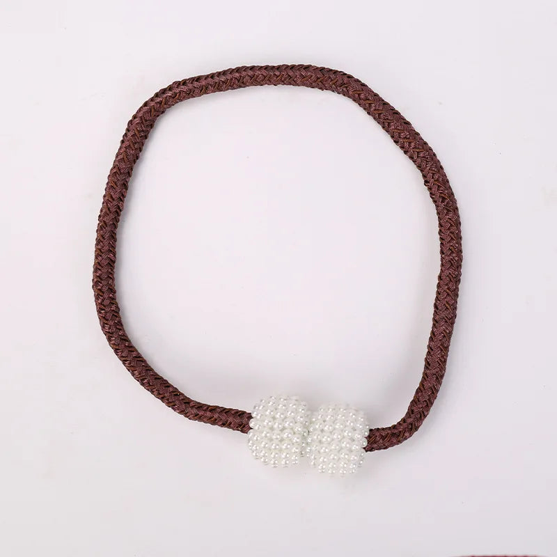 A set of eight elegant pearl magnetic curtain tie-back clips attached to a brown braided cord.