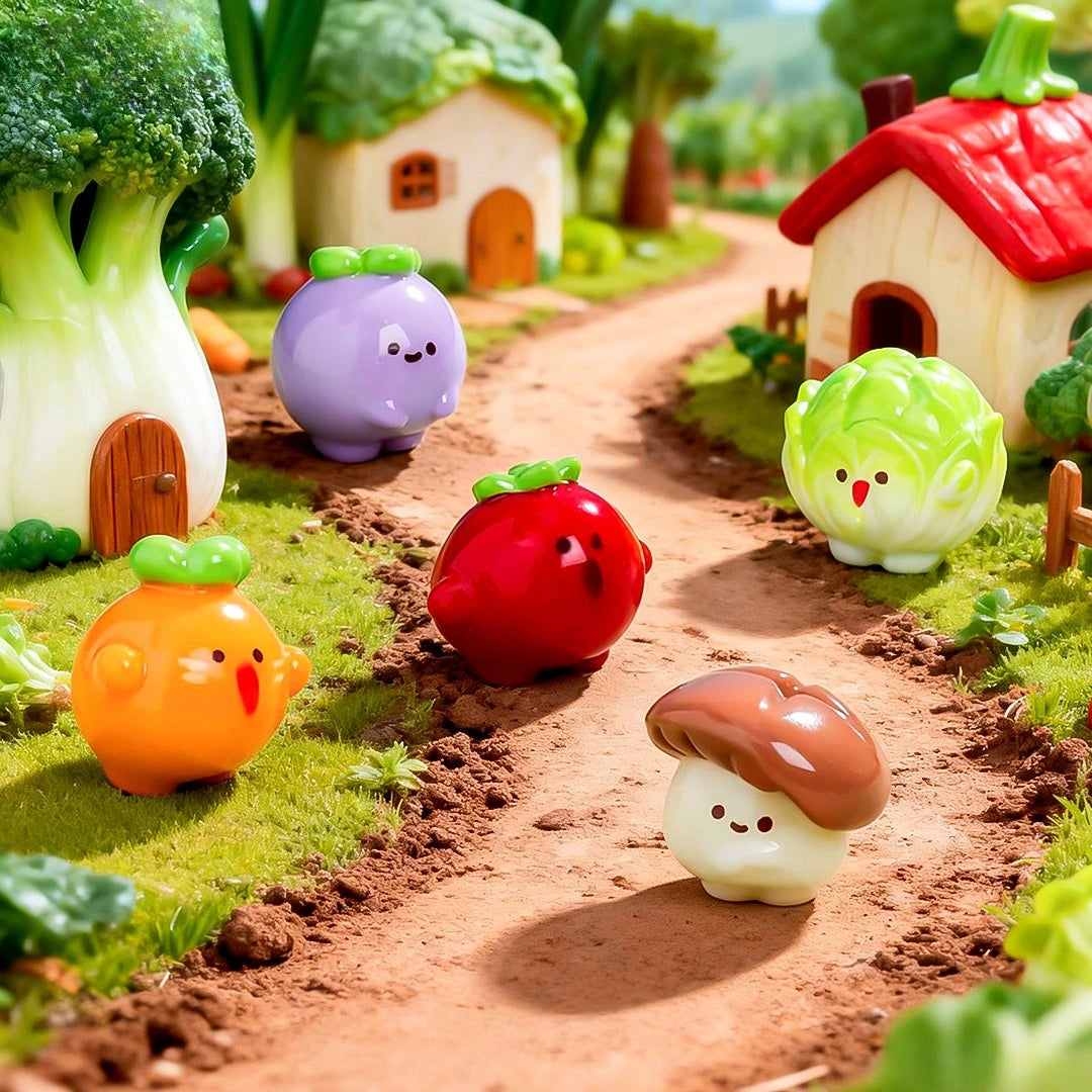 A collection of hand-painted resin vegetable figurines, including a broccoli, a purple pig, a red tomato, and an orange carro