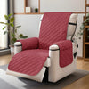 A maroon quilted recliner sofa cover with side pockets displayed on a light gray floor.
