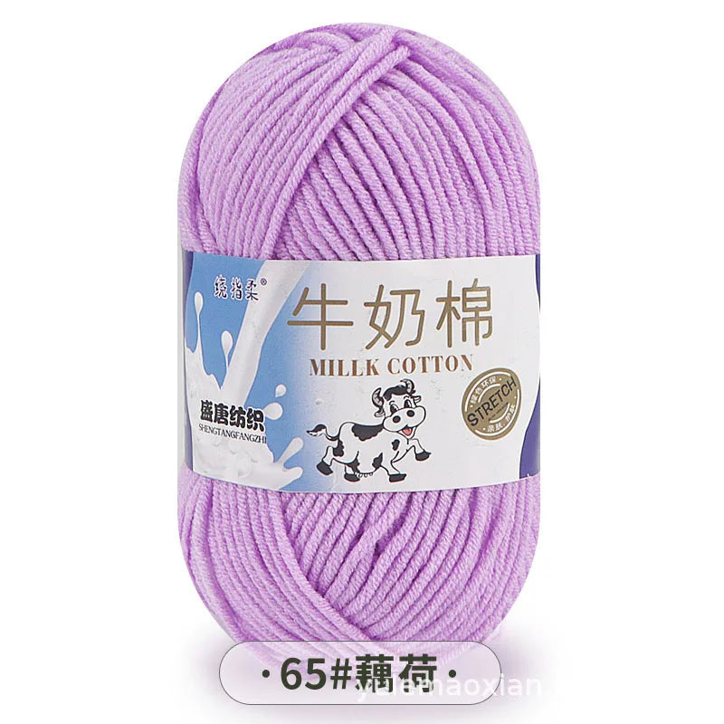 Purple milk cotton blend yarn skein with a label indicating 65# thread size.