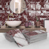 A display of marble self-adhesive wall stickers in various shades and patterns for kitchen and bathroom decor.