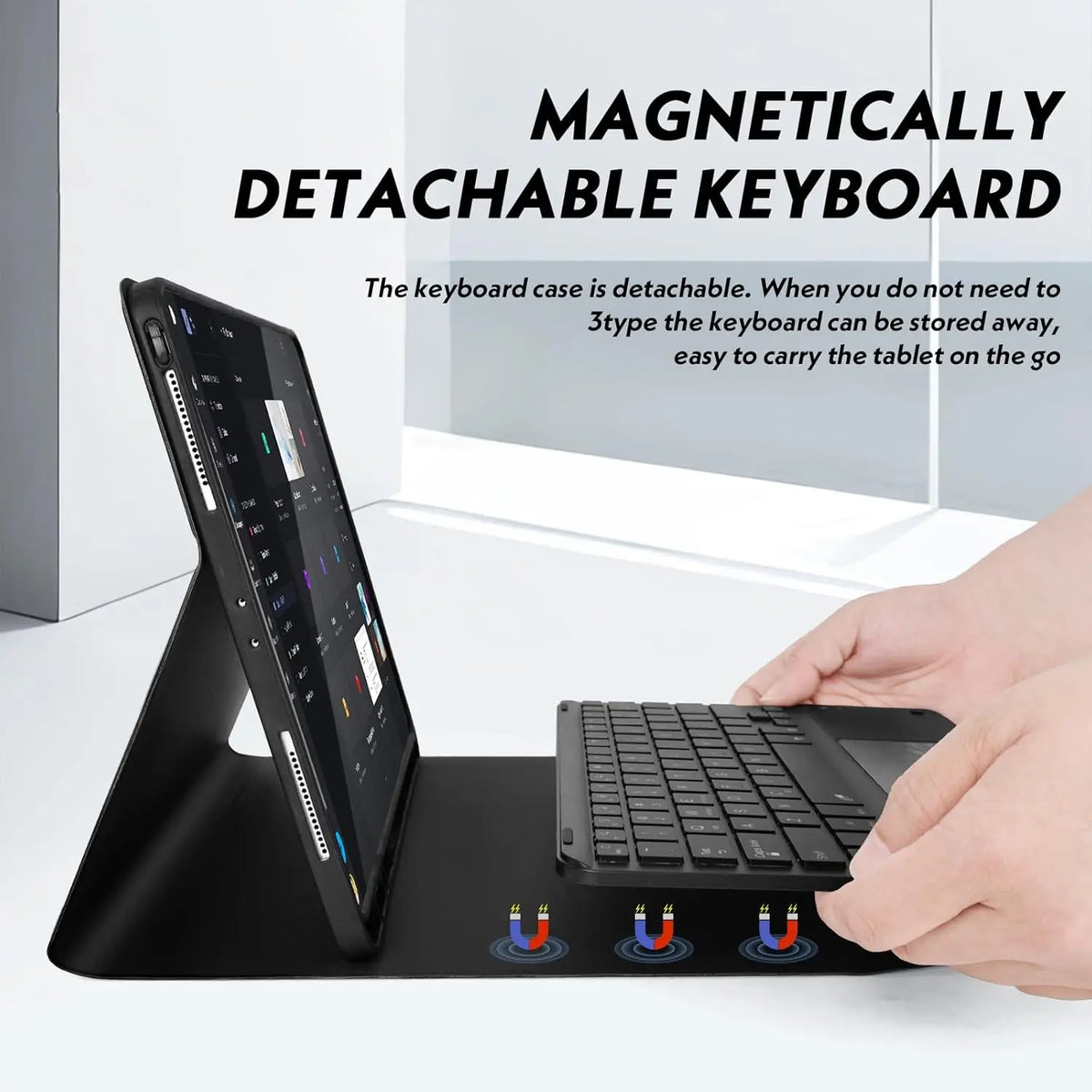 A detachable magnetic keyboard case for a tablet, showing the keyboard and tablet in use.