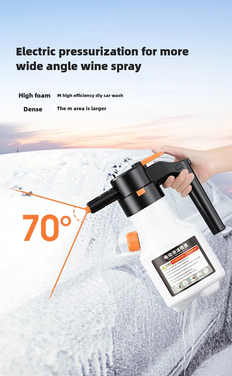 A hand is using a white electric foam sprayer to spray snow with a 70-degree angle.