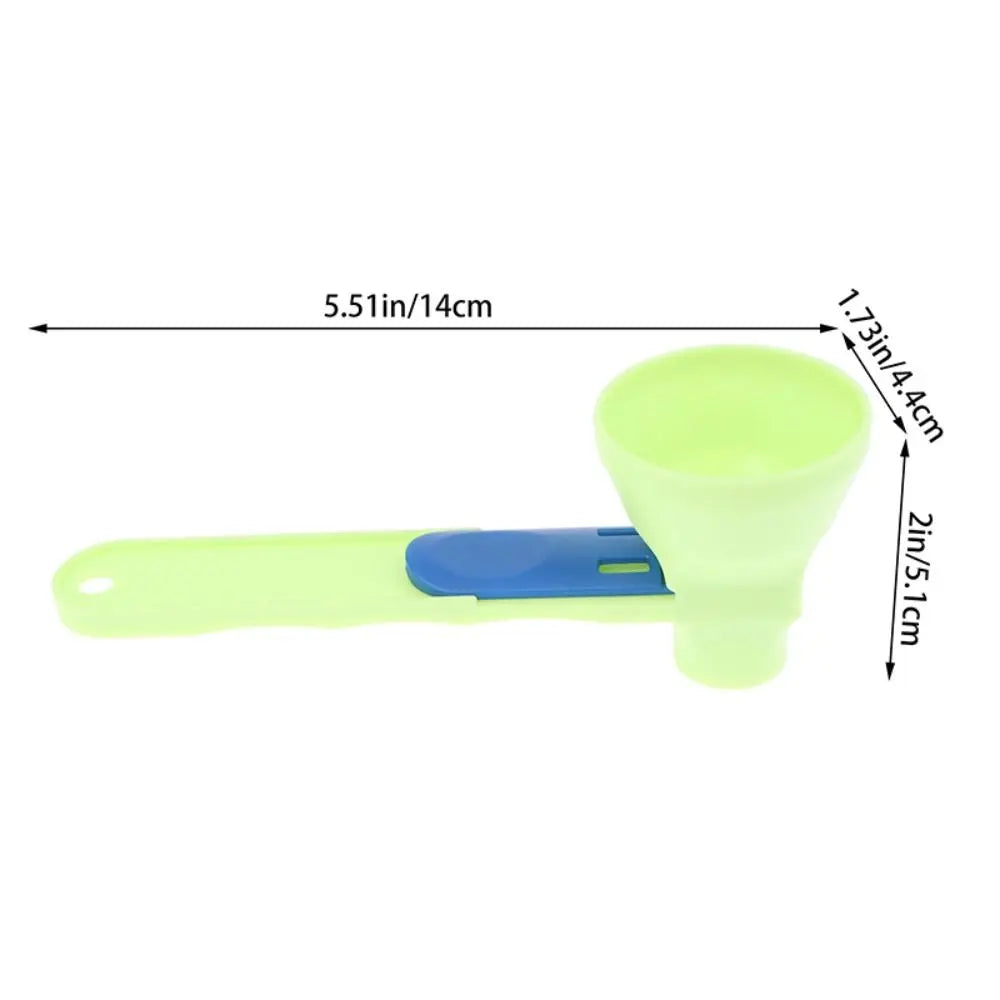 A lime green sliding coffee scoop and funnel tool with a blue handle.