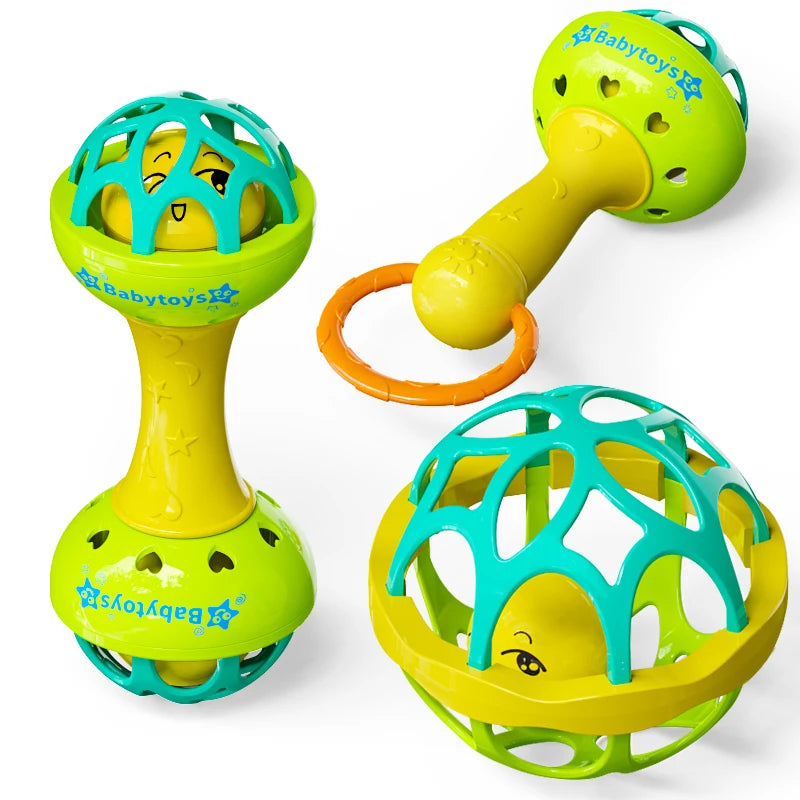 A set of bright green and yellow baby sensory spinning rattle toys for infants.