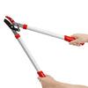 A hand is operating a silver and red telescopic ratchet pruning shear tool for garden trimming.