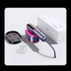 A purple handheld steam iron is shown next to its box and a glass, demonstrating the product.