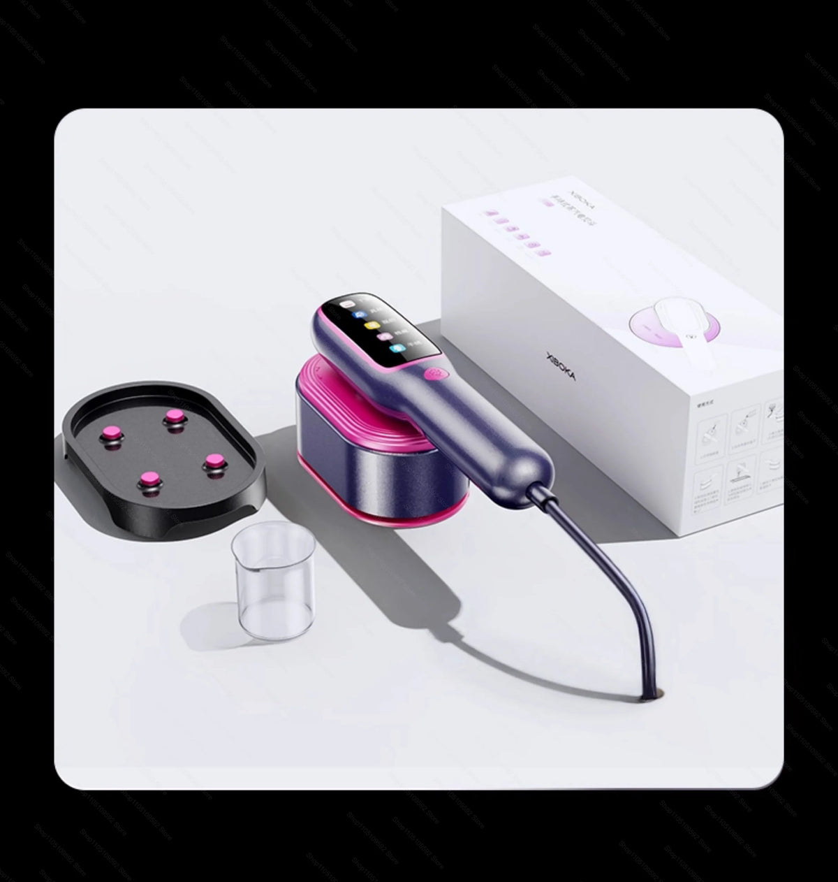 A purple handheld steam iron is shown next to its box and a glass, demonstrating the product.