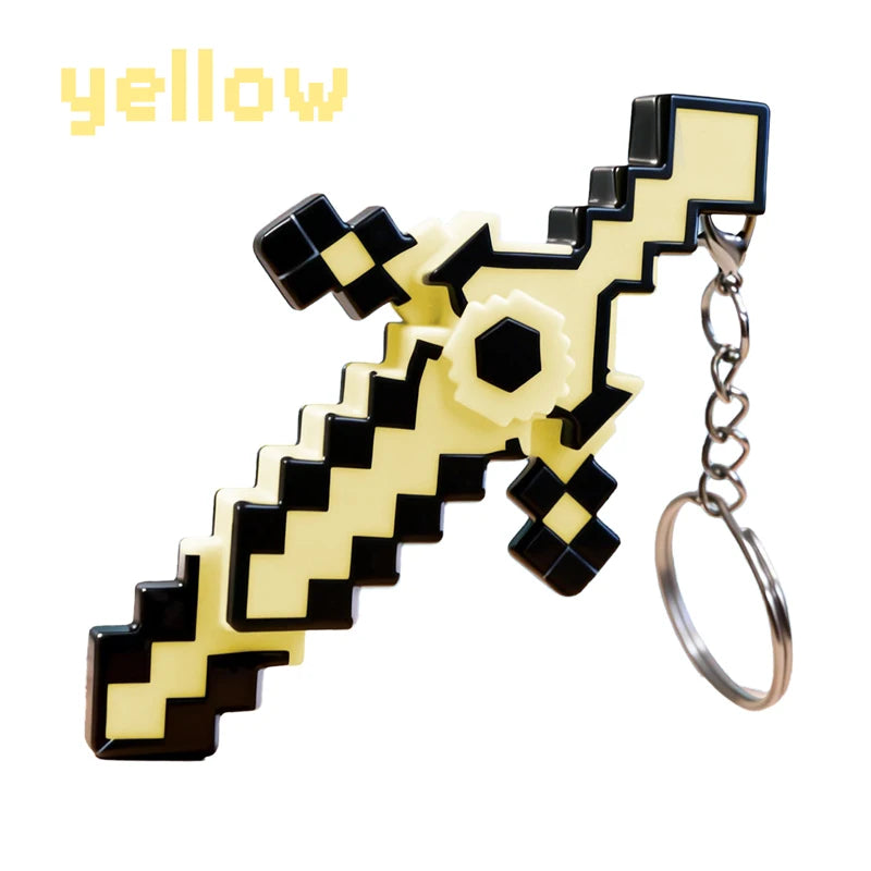 A yellow glow-in-the-dark gemstone toy keychain with a black and yellow checkered pattern.